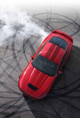 Overhead view of a 2024 Ford Mustang® model with tire tracks on pavement | Pfeifle Ford in Wishek ND
