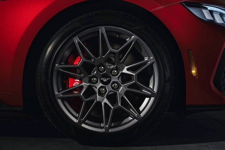 2024 Ford Mustang® model with a close-up of a wheel and brake caliper | Pfeifle Ford in Wishek ND